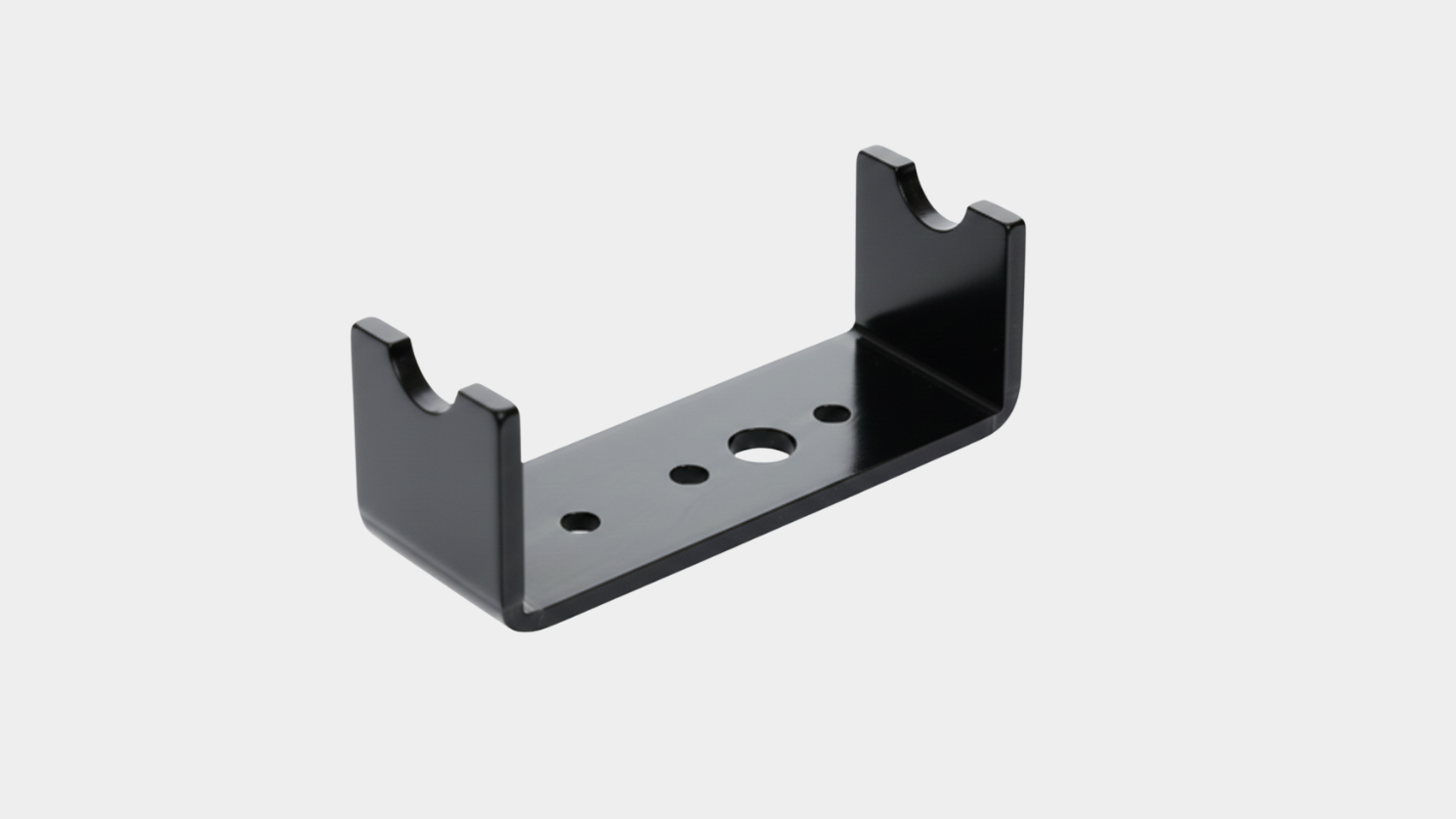 Pre-production metal prototype bracket with precision bent sheet metal and mounting holes.